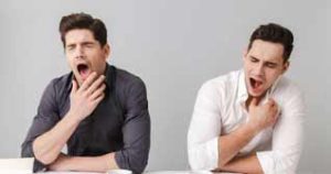 What Does It Mean When Someone Fakes Yawns While Talking To You